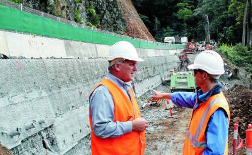 District director for the Department of Transport and Main Roads Paul Noonan and Fulton Hogan senior project engineer Murray Thomas. District director for the Department of Transport and Main Roads Paul Noonan and Fulton Hogan senior project engineer Murray Thomas.